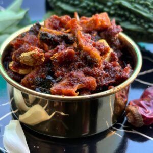 "Authentic Andhra Kakarakaya Pickle – Vasishta Godavari Homemade Bitter Gourd Pickle"